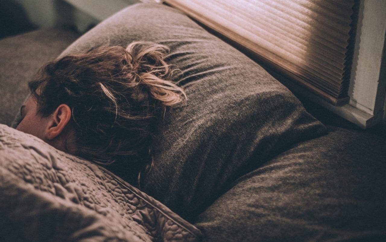woman sleeping in bed