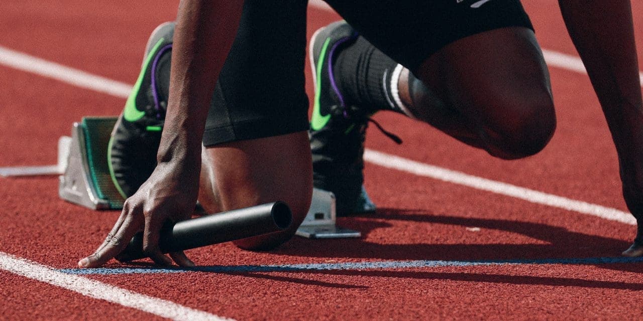 a runner on his starting position in the field