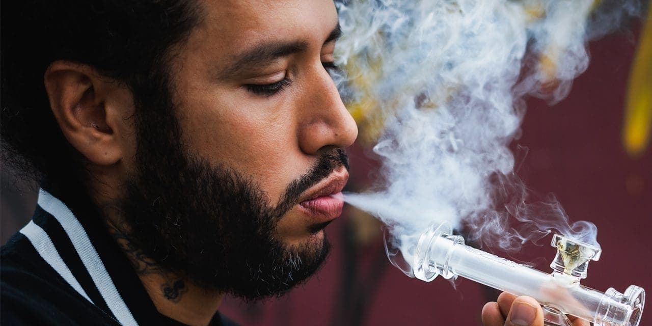 smoking man wearing jacket